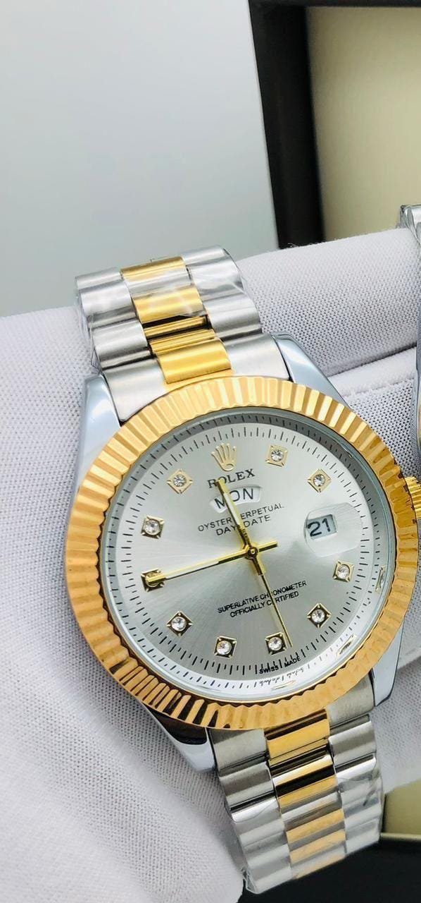 silver chain gold ring white dial