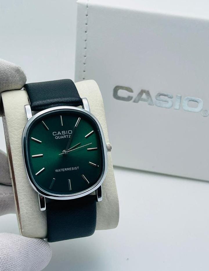 silver with green dial and green strap