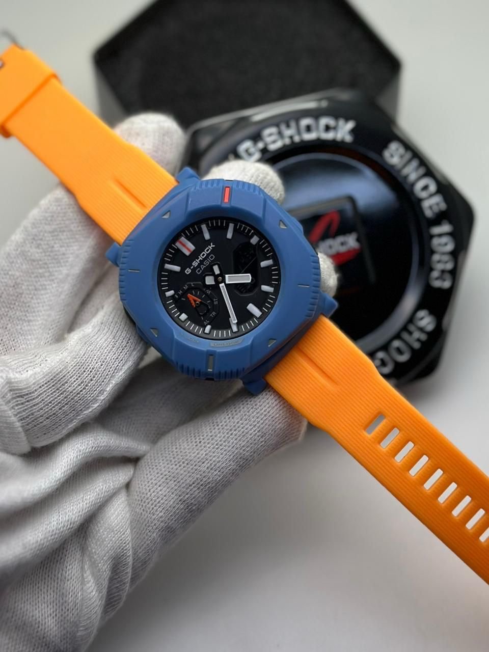 Orange strap blue dial